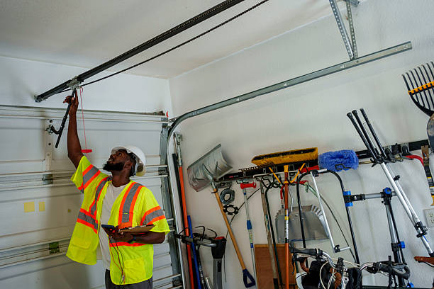 Professional Garage Door Panel Replacement technician working in Hays, KS